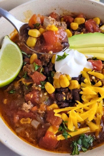 Easy Taco Soup with ground beef, black beans, corn ans cheese