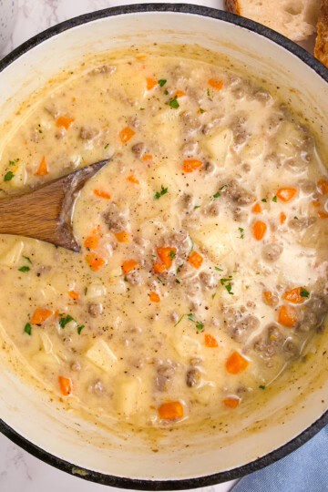 Creamy Potato and Hamburger Soup with cheese and carrots.